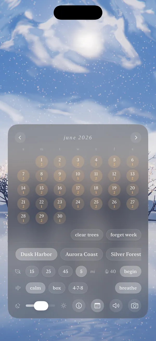 Aurora's frosted control panel floating over a snowy daylight scene: a June calendar of completed focus sessions, mood choices like Dusk Harbor and Aurora Coast, focus lengths, breathing patterns, and a brightness slider.